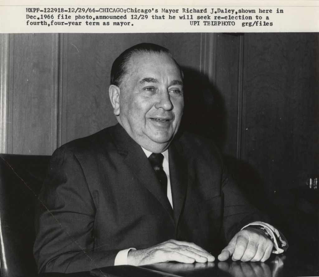 Richard J. Daley seated at a desk