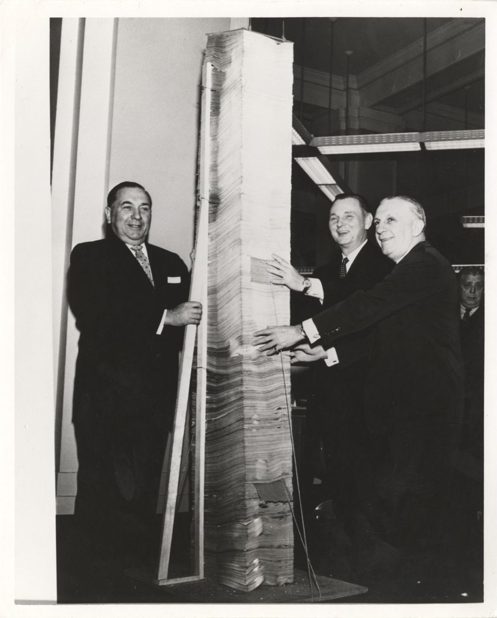 Richard J. Daley with stack of petition papers