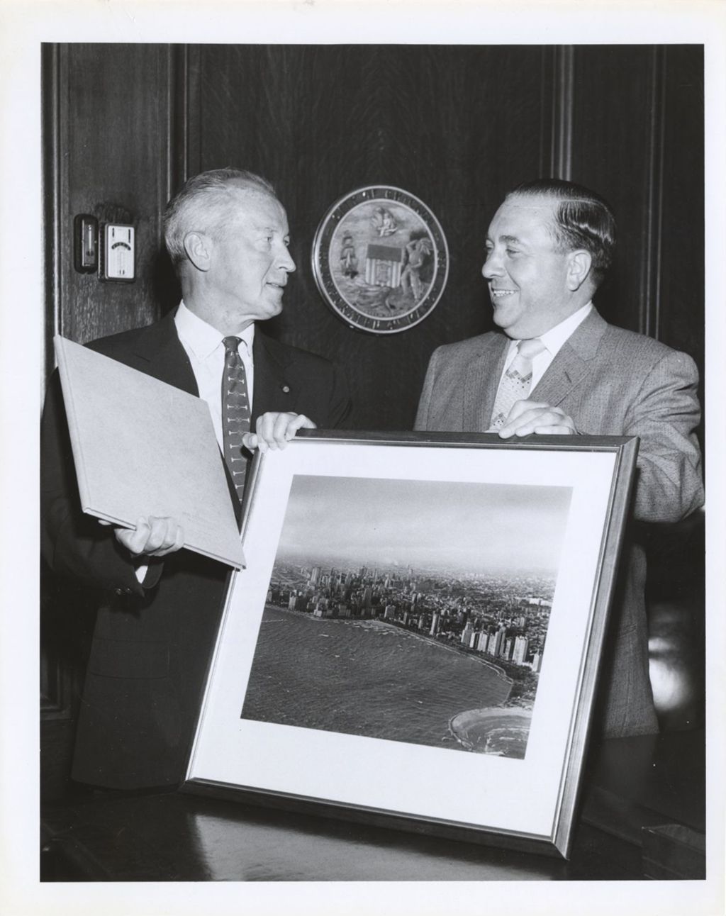 Richard J. Daley with a photograph of the Chicago lakefront