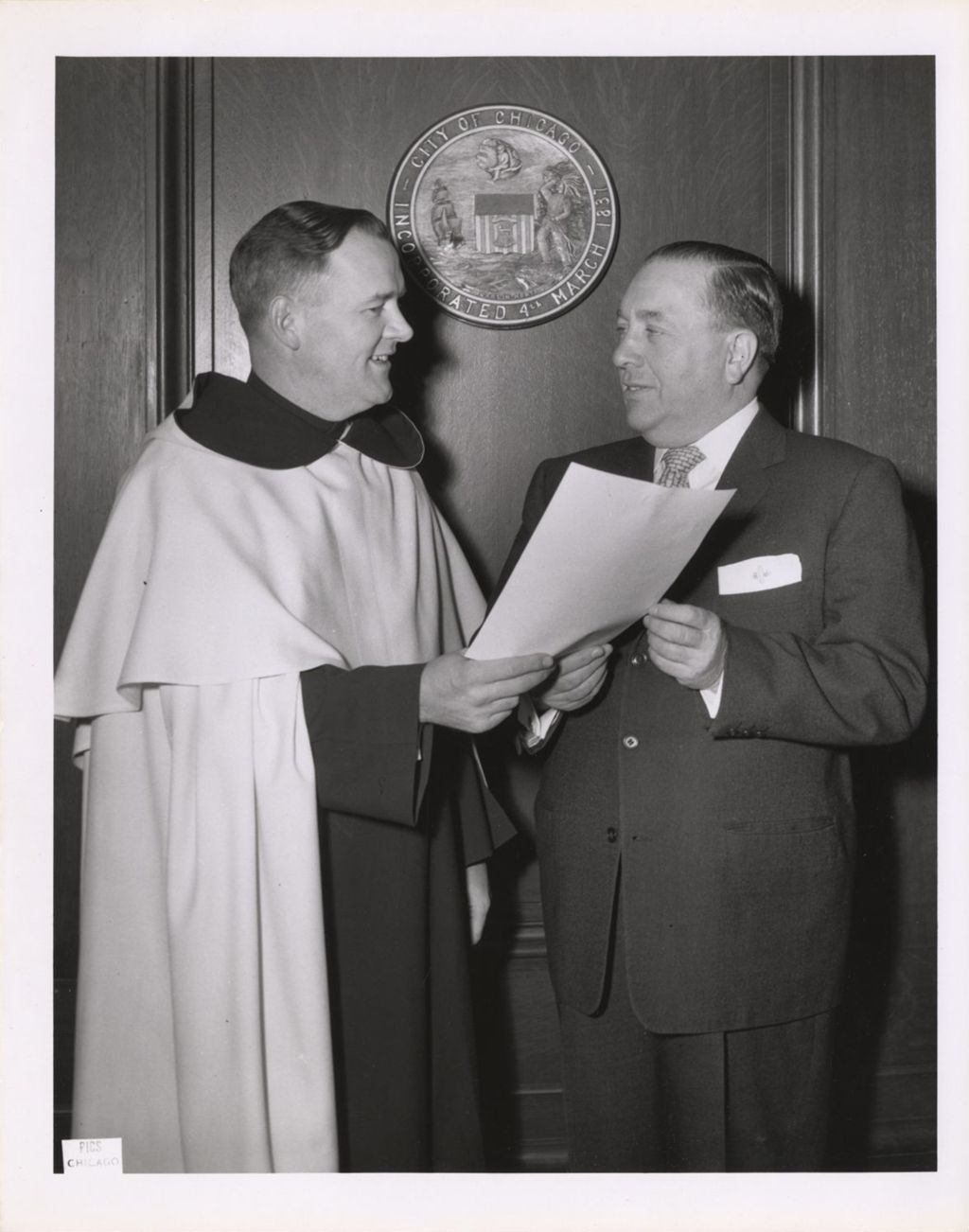 Miniature of Richard J. Daley and a clergyman