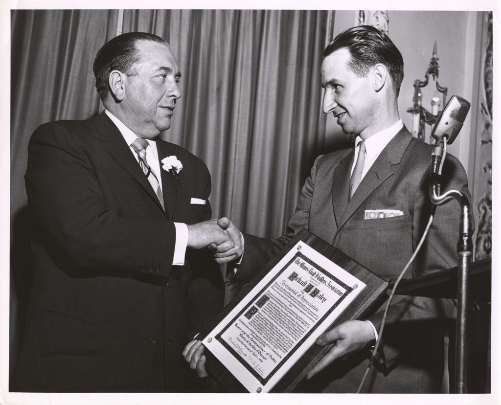 Miniature of Richard J. Daley accepts plaque for completion of the Calumet Skyway