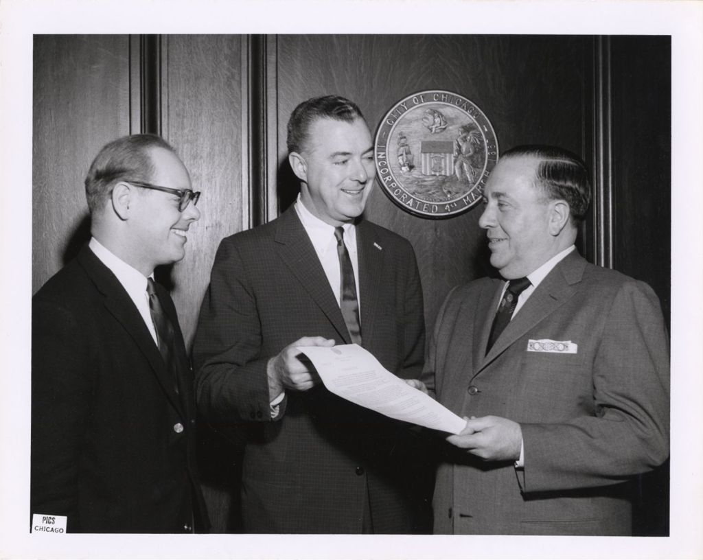 Miniature of Richard J. Daley with signed document