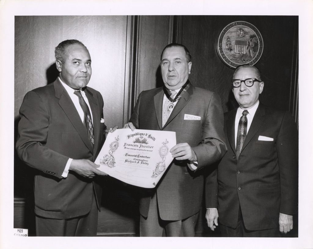 Miniature of Richard J. Daley receiving certificate from the Republic of Haiti