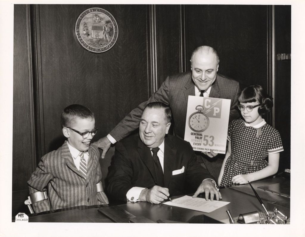 Miniature of Richard J. Daley and others promote a cerebral palsy campaign