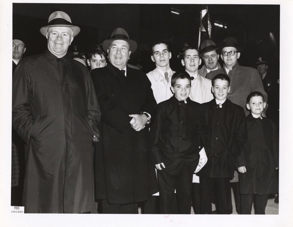 Miniature of Richard J. Daley with his sons at an event