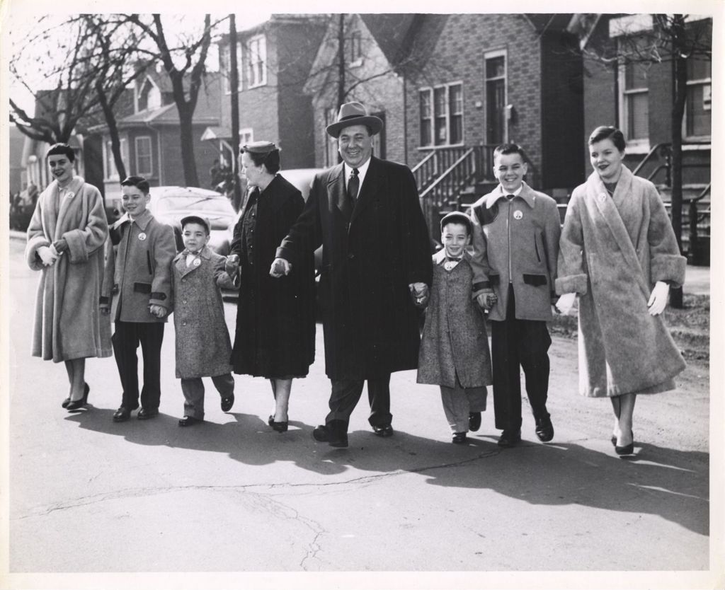 Miniature of Mayoral candidate Richard J. Daley going to the polls with his family