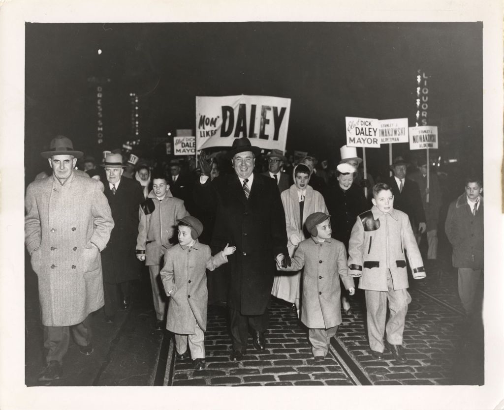 Miniature of Daley family leading Torchlight Parade