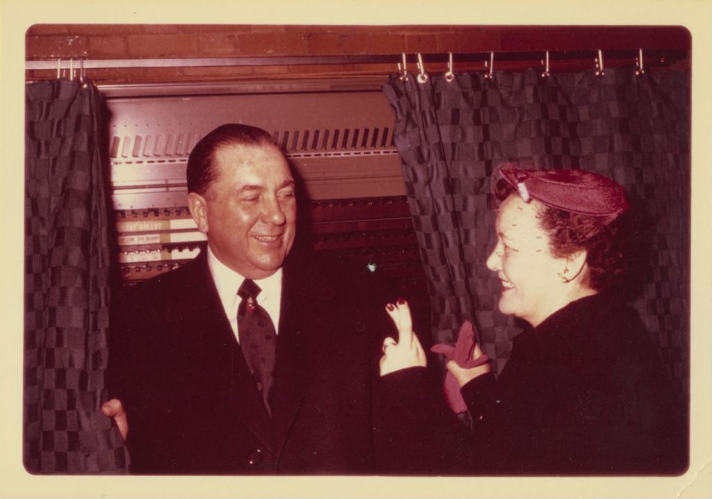 Primary election day, Richard J. and Eleanor Daley at a voting booth