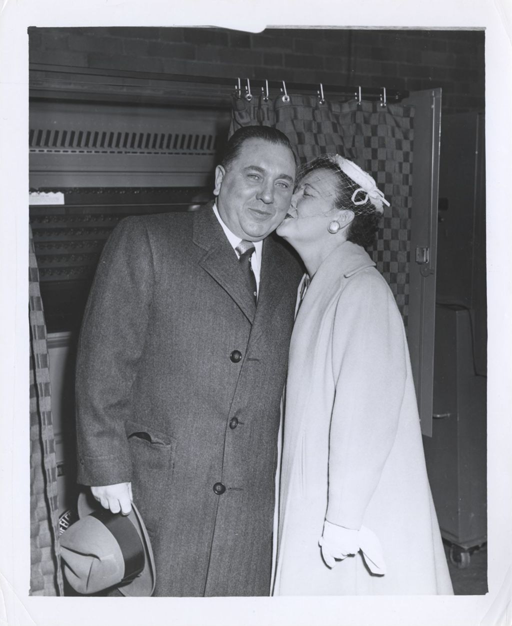 Miniature of Eleanor Daley kisses Richard J. Daley at 11th Ward polling place