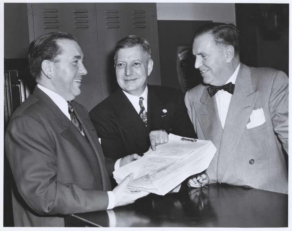 Miniature of Richard J. Daley receives a petition