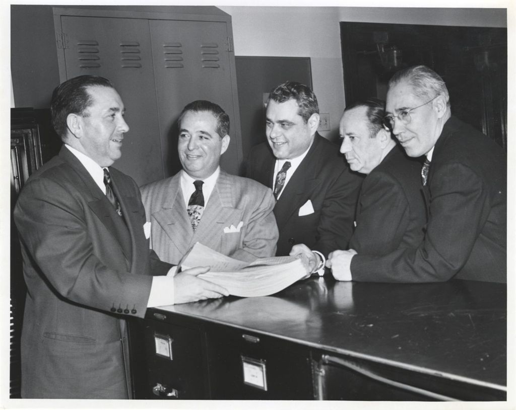 Miniature of Richard J. Daley and group with a petition