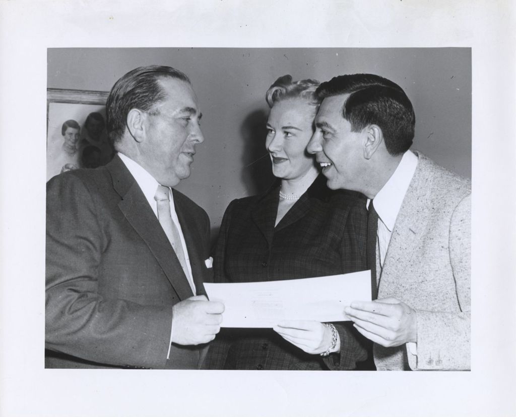 Miniature of Richard J. Daley issues marriage license to Dorothy Towne and Jack Webb