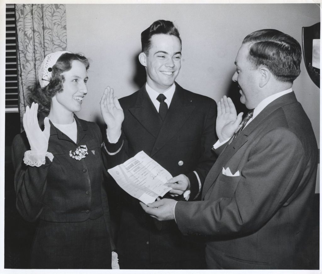 Richard J. Daley performs a marriage ceremony