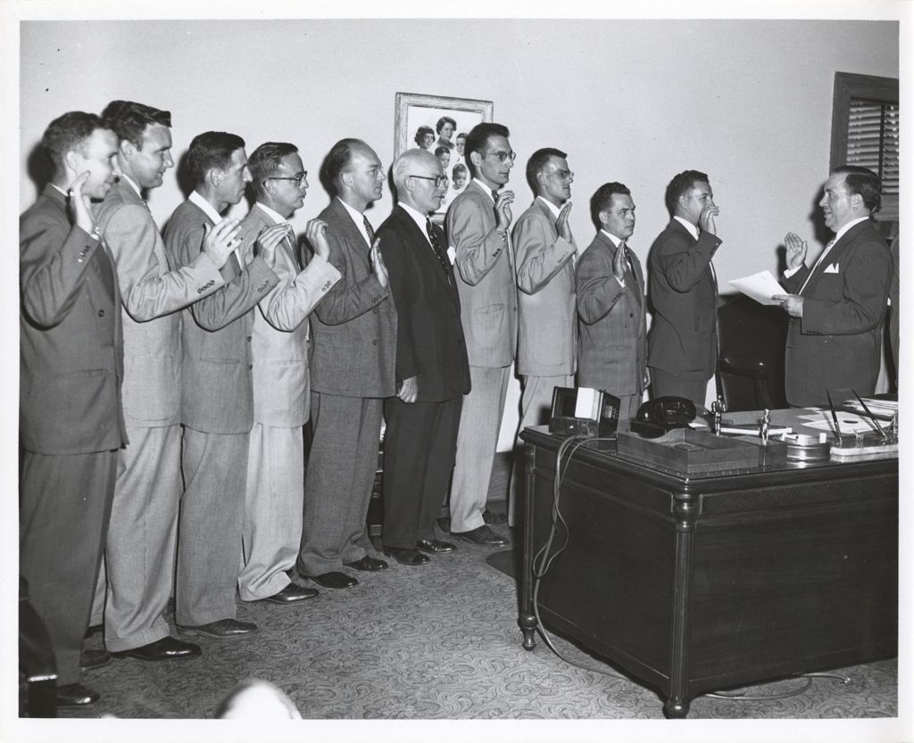 Miniature of Richard J. Daley administering oath to Hometown, Illinois officers
