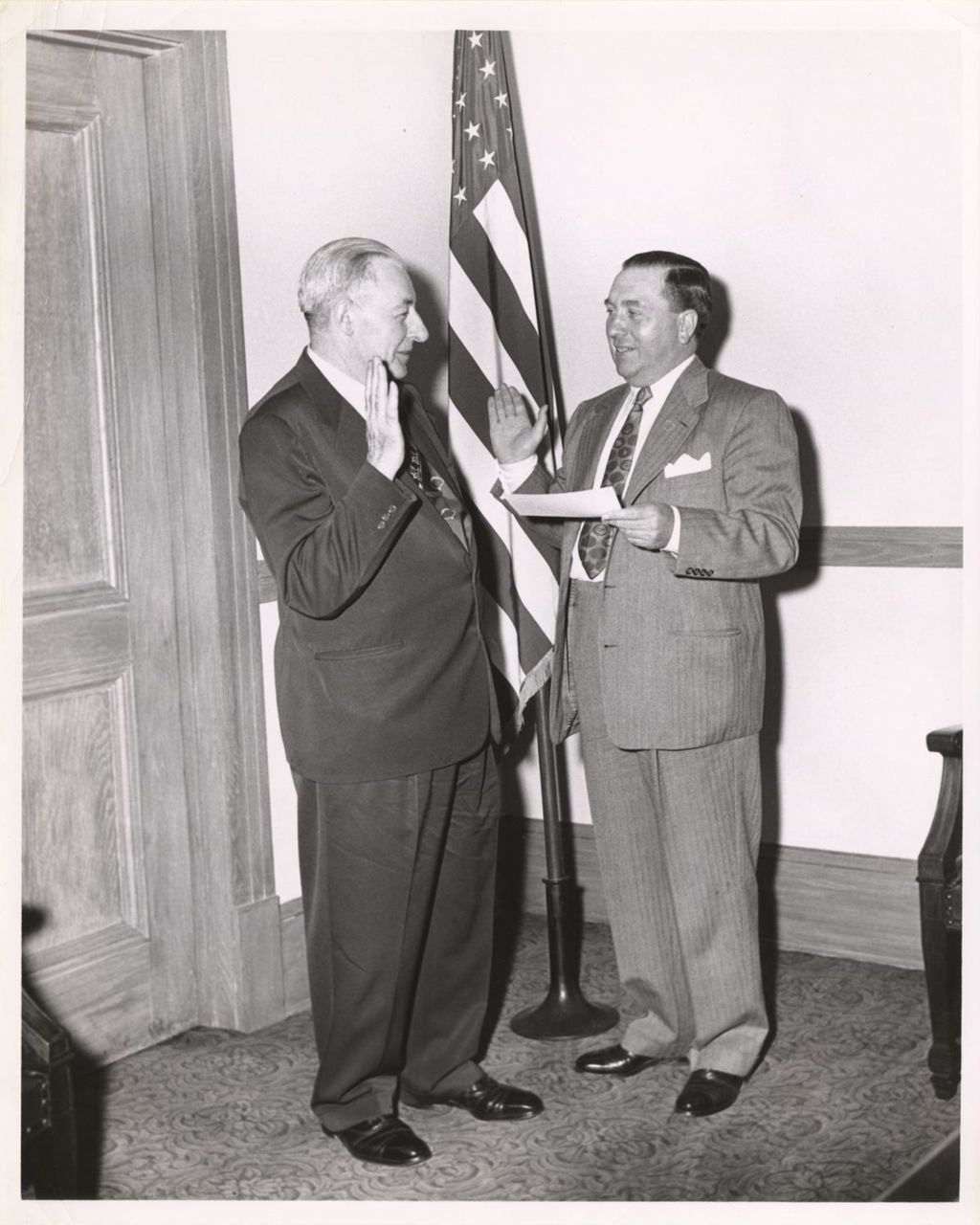 Richard J. Daley administers an oath