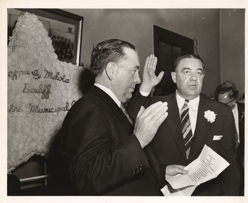 Richard J. Daley administers oath to William Milota