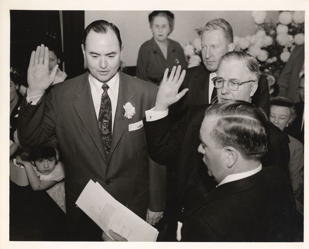 Miniature of Richard J. Daley administers an oath to two men