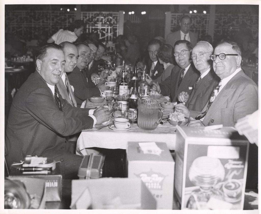 Miniature of Richard J. Daley with others at a Revenue banquet