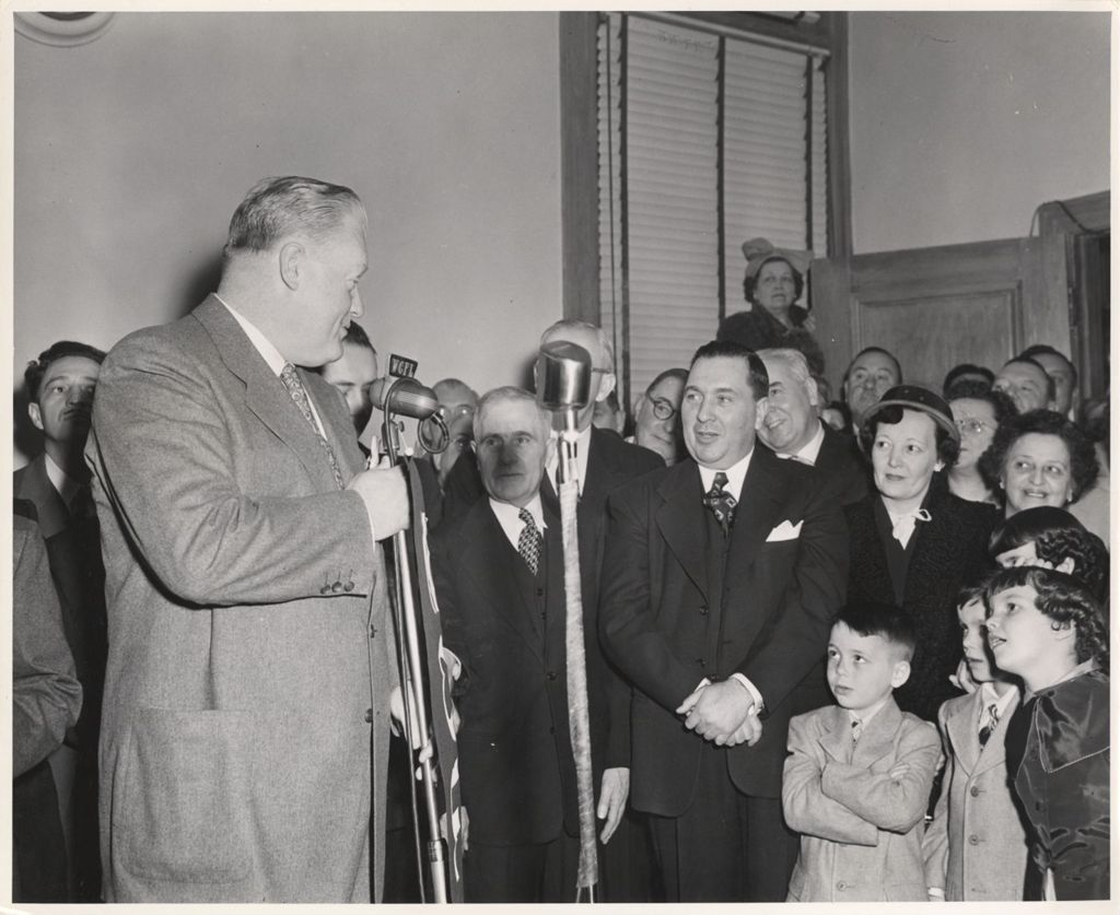 Miniature of County Clerk installation, man at microphone