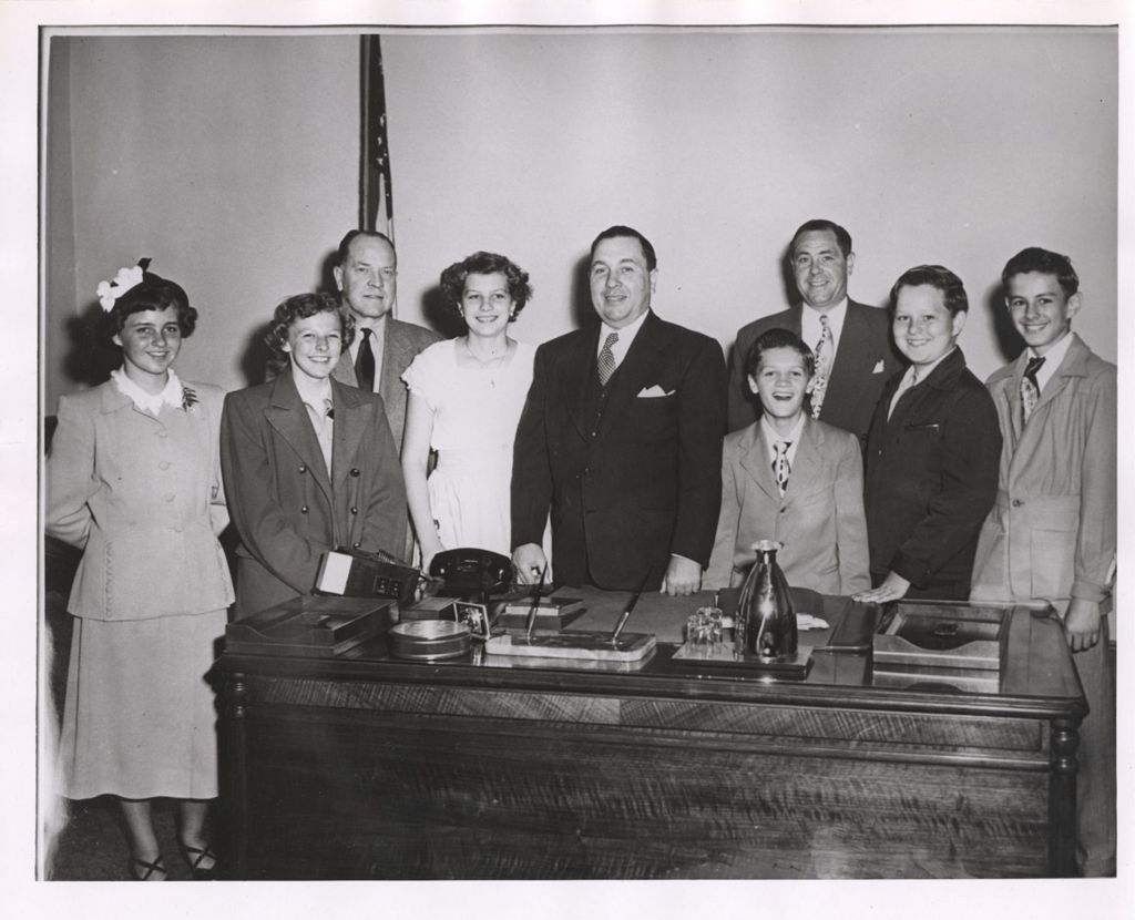 Miniature of Richard J. Daley at a desk with Bridgeport youths
