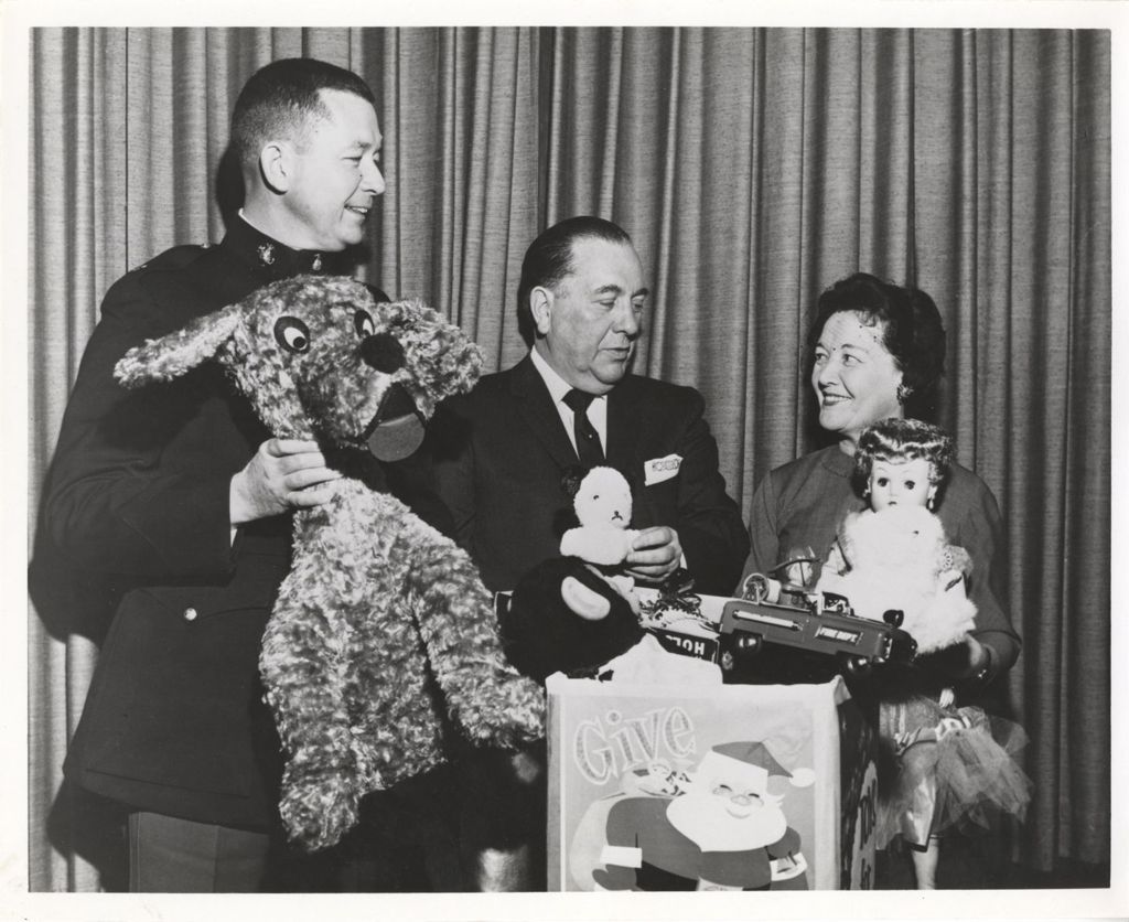 Miniature of Eleanor and Richard J. Daley with toys donated to Toys for Tots
