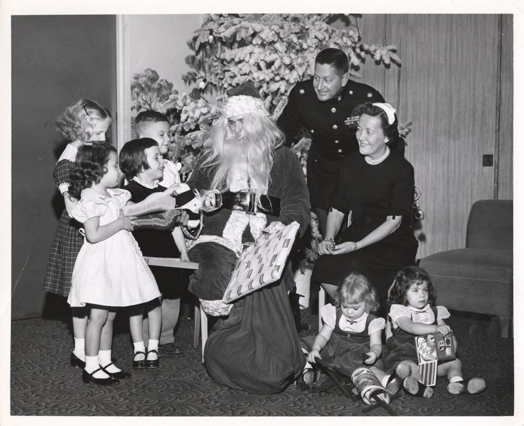 Miniature of Eleanor Daley with Santa and others at Toys for Tots event
