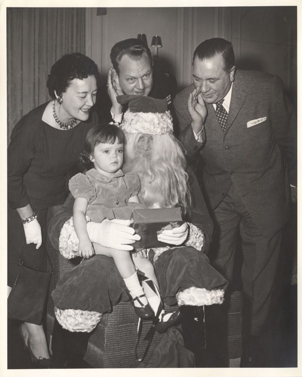 Miniature of Eleanor and Richard J. Daley with child visiting Santa