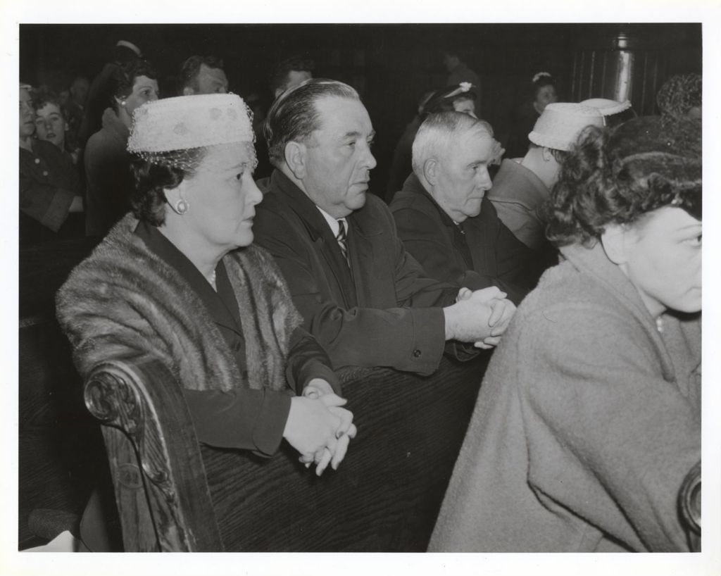 Miniature of Richard J. Daley with his wife and father at midnight Mass