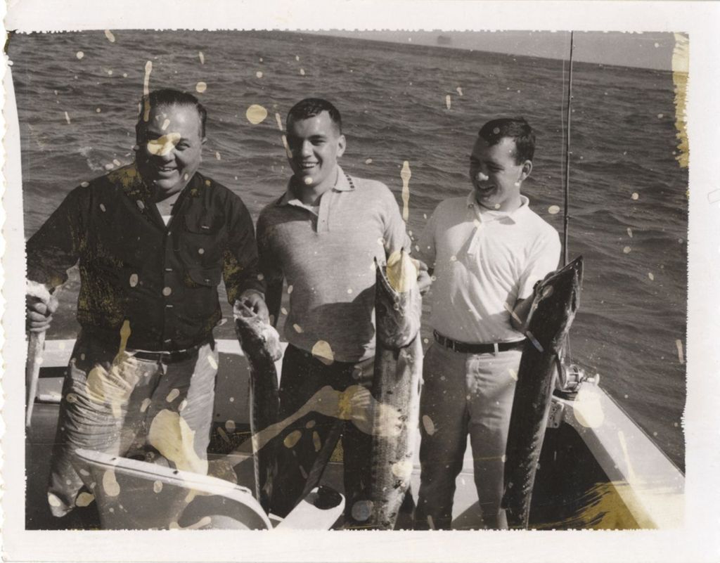 Miniature of Richard J. Daley and two of his sons display their catch