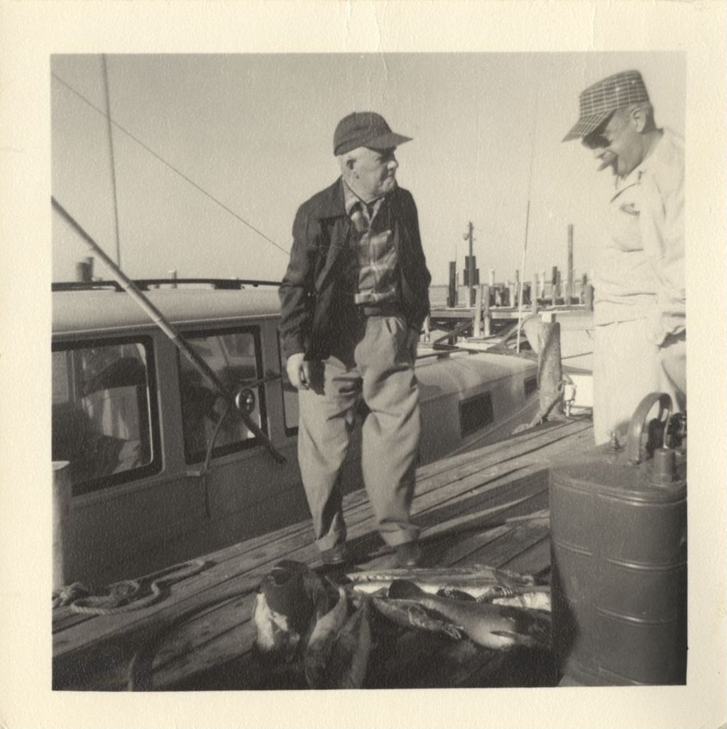 Miniature of Michael J. Daley on a dock with Senator Lynch