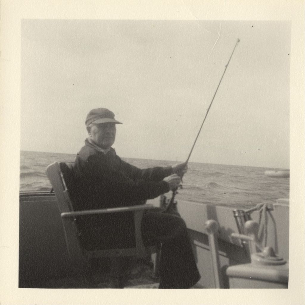 Miniature of Michael J. Daley fishing from a boat