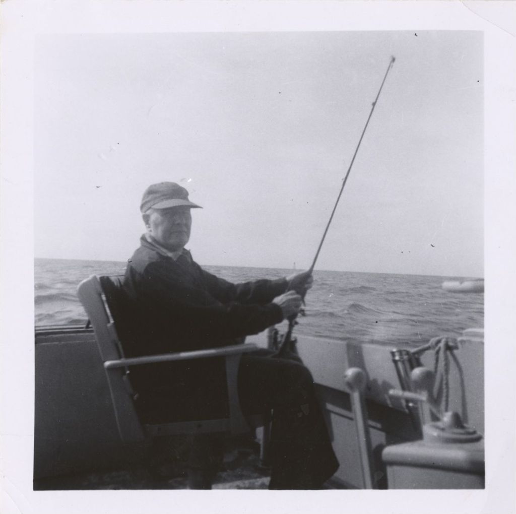 Miniature of Michael J. Daley fishing from a boat