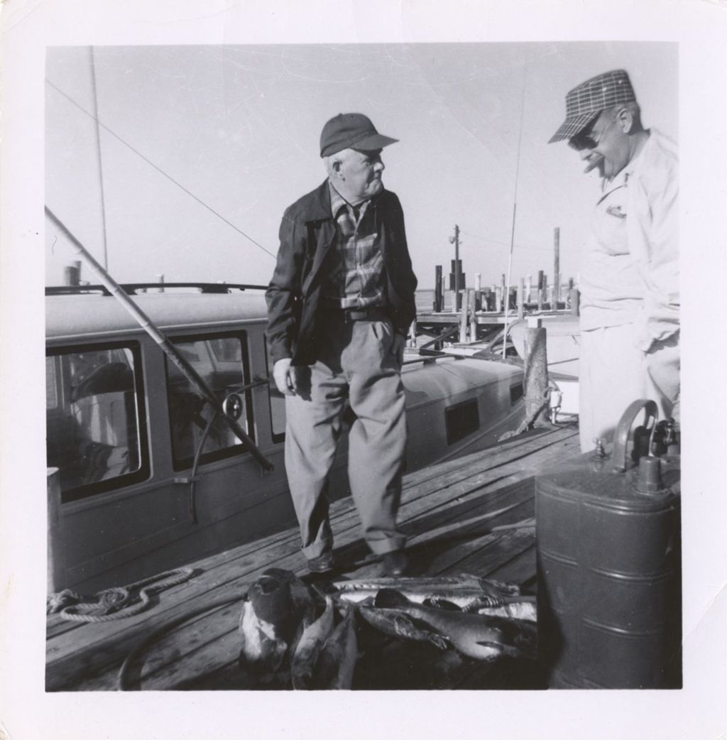 Miniature of Michael J. Daley on a dock with Senator Lynch