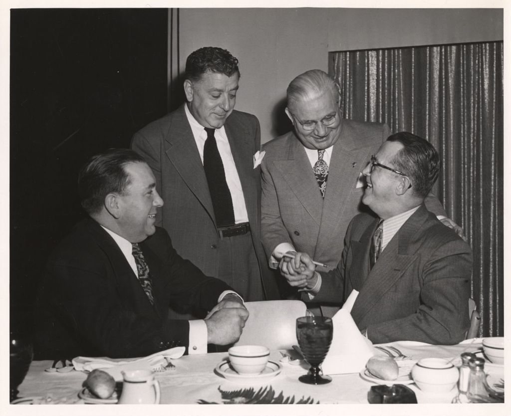 Miniature of Richard J. Daley with others at a dining event