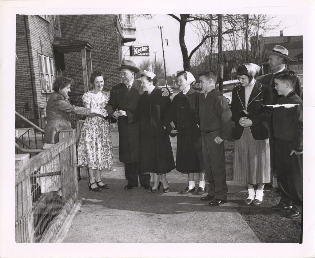 Miniature of Richard J. Daley and Eleanor Daley shaking hands with neighborhood women