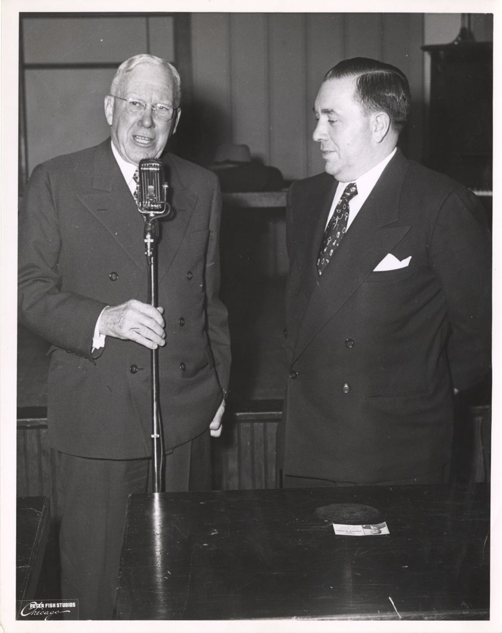Miniature of Richard J. Daley and a man at a microphone