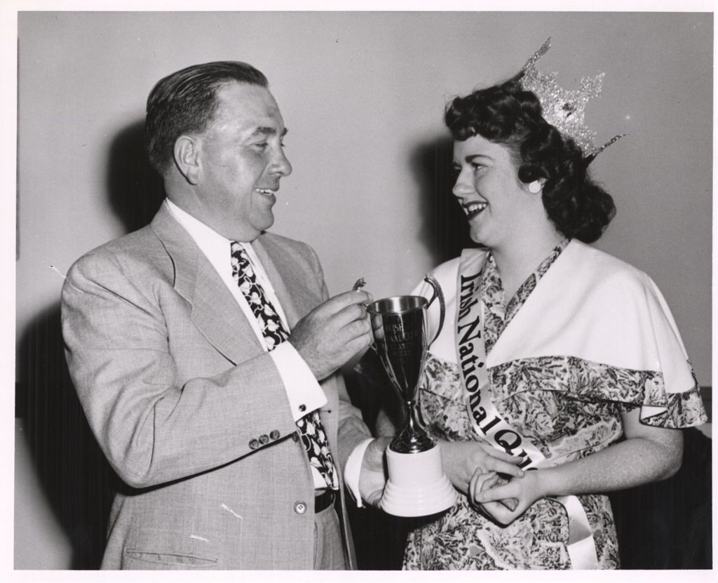 Miniature of Richard J. Daley presenting a trophy to the Irish National Queen