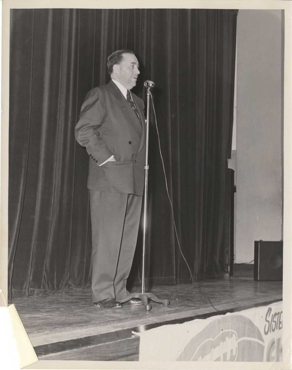 Miniature of Richard J. Daley speaking from a stage