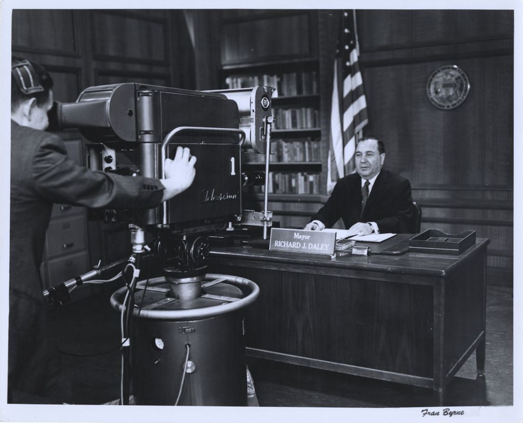 Richard J. Daley being filmed by a television camera