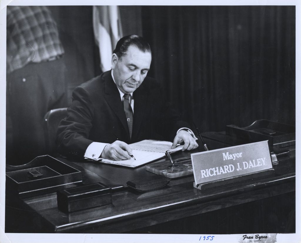 Richard J. Daley working at his desk
