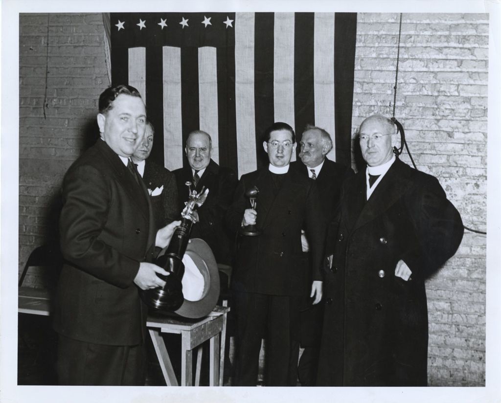 Miniature of Richard J. Daley holding a trophy