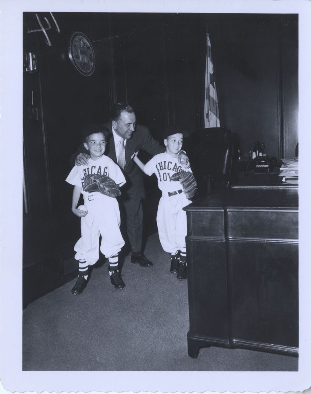 Miniature of Richard J. Daley with his sons in Chicago Police baseball uniforms