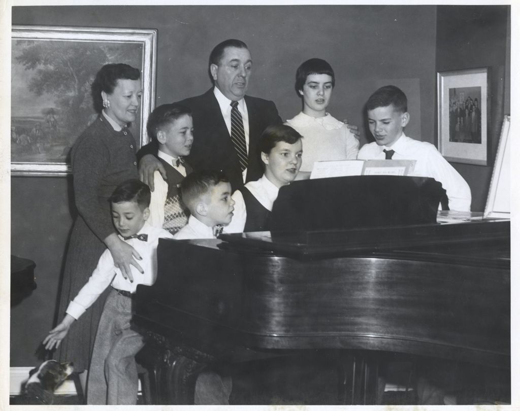 Miniature of Daley family around the piano