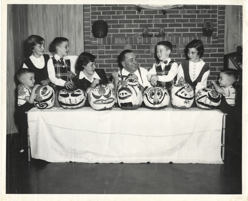 Miniature of Daley family with Halloween pumpkins