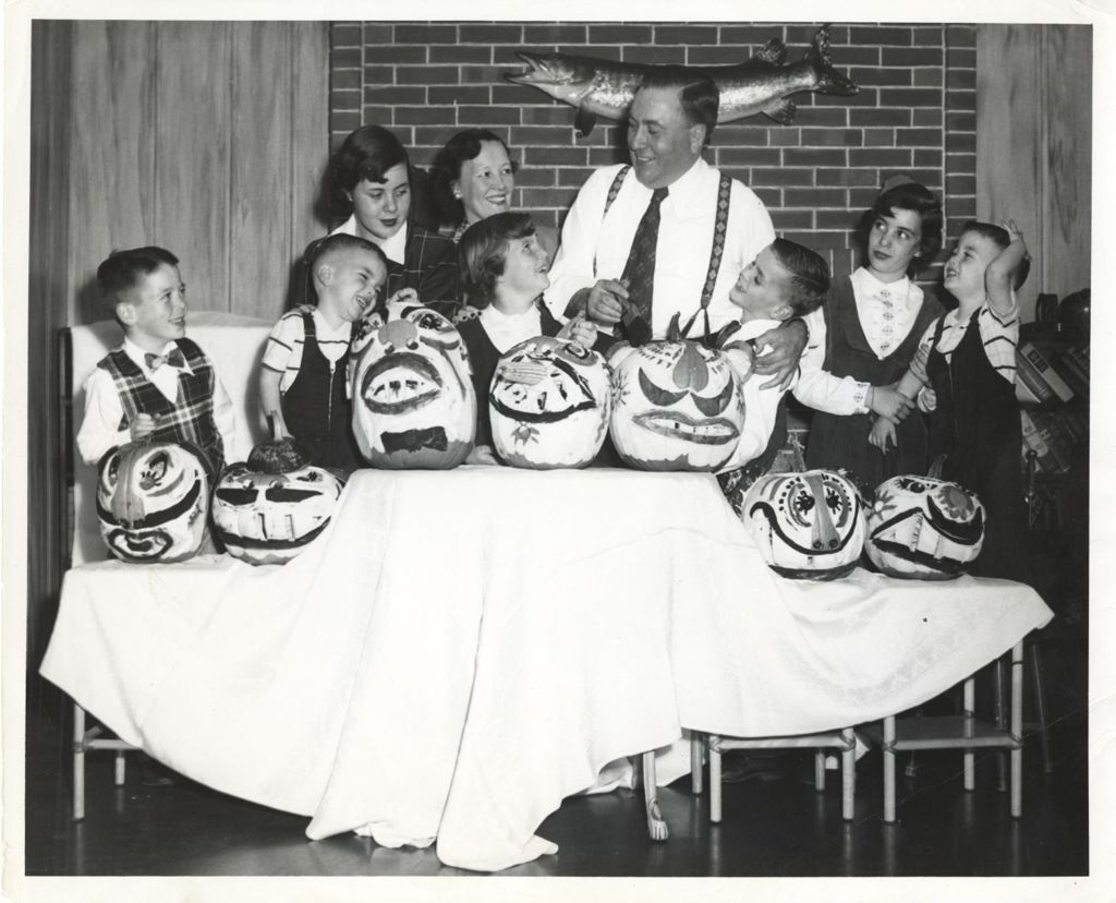 Daley family with decorated pumpkins