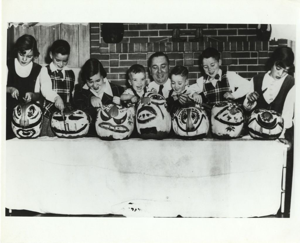 Miniature of Daley family with decorated pumpkins