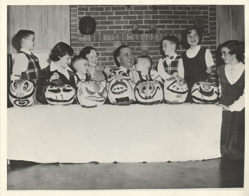 Miniature of Daley family with decorated pumpkins