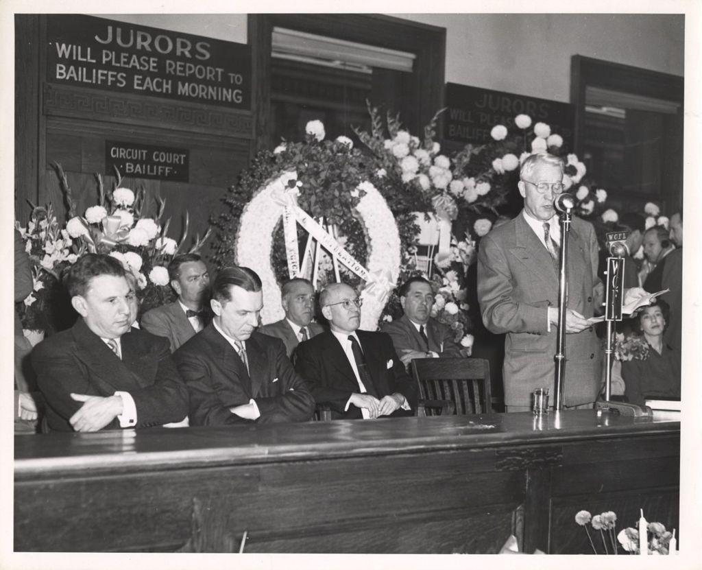 Miniature of Richard J. Daley and others listen to a courtroom speech