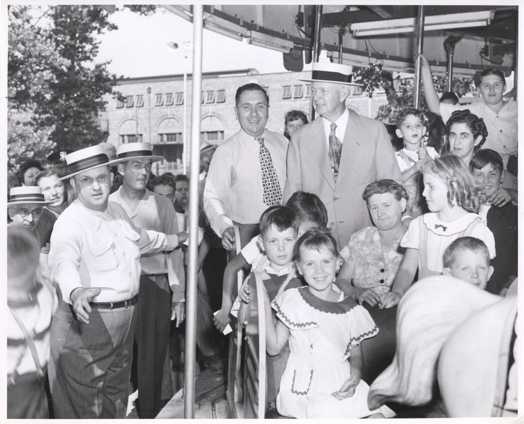 11th Ward Picnic, Richard J. Daley and Martin Kennelly on a carousel