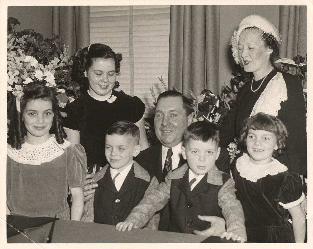 Miniature of Richard J. Daley with his family at his installation as Director of Revenue